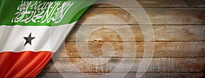 Somaliland flag on vintage wood wall banner