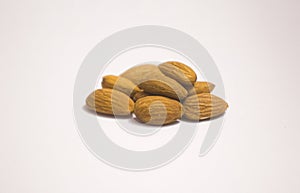 Some almonds on a white background