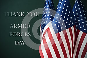 Text armed forces day and american flags photo