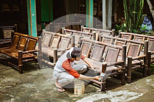 some bamboo chair crafts are finished by bamboo chair craftsmen