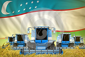 Some blue farming combine harvesters on rye field with Uzbekistan flag background - front view, stop starving concept - industrial