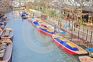 Some boats by the river bank