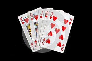 Some cards for playing cards games and gambling on a black background photo