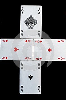 Some cards for playing cards games and gambling on a black background photo