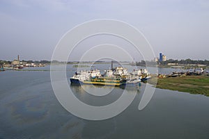 Some cargo ships in the river