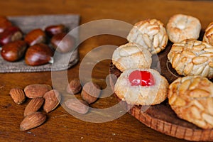 Some catalan panellets with almonds and roasted chesnuts. Typical desert in Catalonia in Halloween Called la Castanyada photo