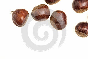 Some Chestnuts Isolated on White Background