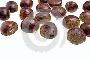 Some Chestnuts Isolated on White Background