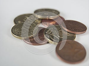 Some coins with closeup on bright background european money photo