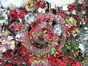 Some colorful Christmas trees with decorations at a departmental store