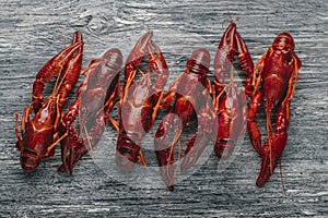 some cooked crayfish arranged in a line