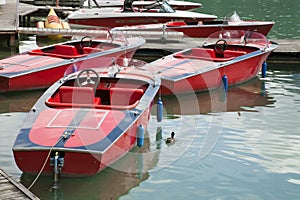 Some electric boats at the jetty of an Austrian lake