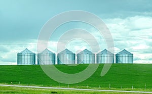 Some farm grain bins on a agriculture facility in Lethbridge
