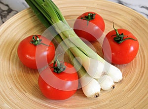 Some fresh tomatoes and spring onion