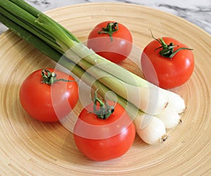 Some fresh tomatoes and spring onion