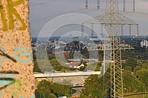High voltage power lines over a background of the Ruhr are