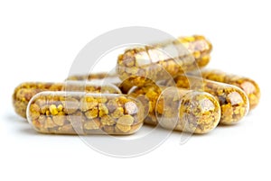 Some homeopathic pills with bee pollen photo