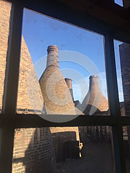 Bottle kiln courtyard through the window photo