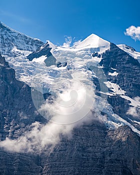 Some nice clouds on the flanks of the pyramid-shaped Silberhorn