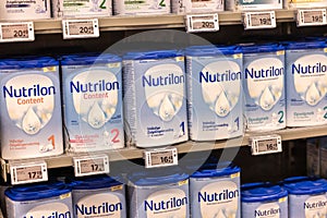 Packages of Nutrilon baby milk on a shelf in a supermarket