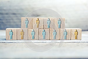 Some People Of An Infection, Voting Or Survey Are Marked On Wooden Blocks On A Board photo