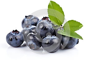 Some ripe fresh blueberries with blueberry leaves on isolated white background. Organic farm food, fresh market.