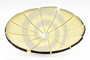 Some slices of manchego cheese photo