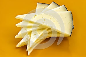 Some slices of manchego cheese photo