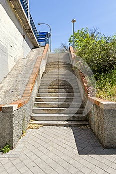 Some stairs with granite steps to bridge