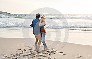 Some summer fun is all you need. a middle aged couple spending the day at the beach.