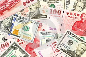 Some taiwan dollar bank notes and us dollar banknotes mixed indicating bilateral economic relations