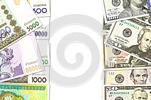 Some Uzbek Som banknotes and us-dollar banknotes indicating bilateral economic relations with copy space