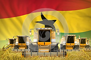 Some yellow farming combine harvesters on rye field with Ghana flag background - front view, stop starving concept - industrial 3D