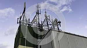 Various Cellular, Data and Radio Antennas at the top of a building in Suzano - SÃÂ£o Paulo, Brazil photo