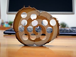 Something of wood on the table