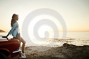 Sometimes life will take you on unbelievably beautiful journeys. a young woman enjoying a road trip along the coast.