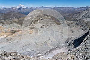 Sommeiller peak with Black lake, Grande Casse and Mont Blanc mountains in the background photo