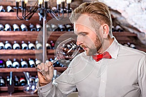 Sommelier in the wine cellar