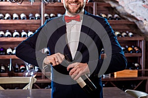 Sommelier in the wine cellar