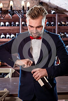 Sommelier in the wine cellar