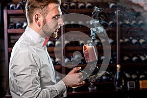 Sommelier in the wine cellar