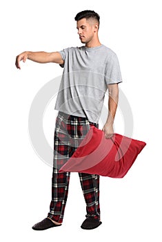 Somnambulist with red pillow on white background. Sleepwalking