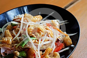 Somtam (Papaya Salad) with pork crackling