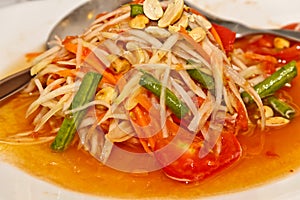 Somtum - Thai Green papaya salad photo