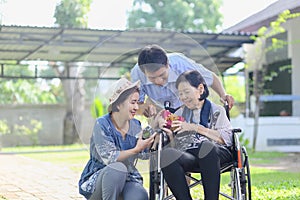 Son and daughter in law gift elderly mother.