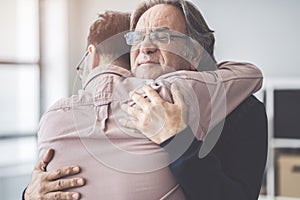 Son hugs his own father