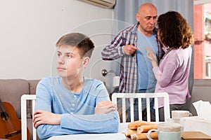 Son suffering from parents conflicts