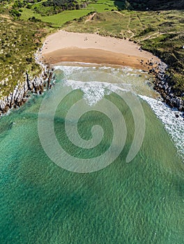 Sonabia beach drone aerial view in Cantabrian sea