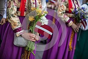 Song and dance festival in Latvia. Procession in Riga. Elements of ornaments and flowers. Latvia 100 years.