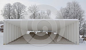 Song festival ground in Viljandi. Sunny winter day, frosty trees in background.